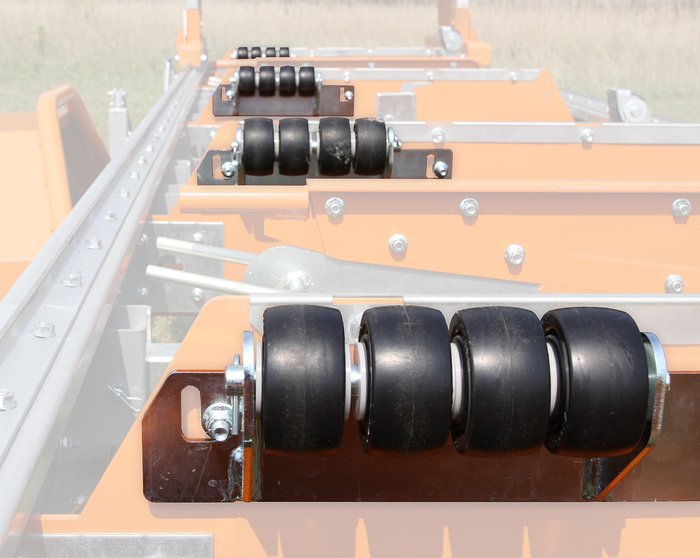Norwood board offloading rollers